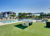 Thumbnail 24 of 39 - Outdoor Ping-Pong Table at Highland Luxury Living, Lewisville