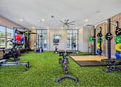 Thumbnail 31 of 53 - well-equipped home gym at Vine + Vail Townhomes and Apartments, Grapevine, 76051