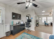 Thumbnail 31 of 40 - Home office area with reception desk and furniture at Arbors Of Corsicana Apartments, Corsicana, TX 75110