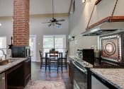 Thumbnail 13 of 34 - Kitchen Bar With Granite Counter Top at Bardin Oaks, Texas, 76018