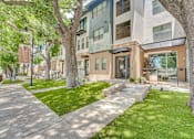 Thumbnail 49 of 53 - Modern townhome exterior with landscaped lawn at The Barton Apartments, Texas, 75206