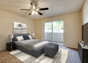 Thumbnail 10 of 42 - A bedroom with a bed, nightstand, and a ceiling fan at Copper Hill Apartments, Texas