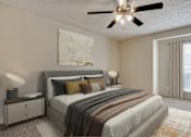 Thumbnail 5 of 42 - A bedroom with a large bed, a ceiling fan, and a painting on the wall at Copper Hill Apartments, Bedford 76021