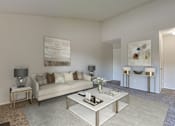 Thumbnail 3 of 42 - A living room with a white couch, a coffee table, and a painting on the wall at Copper Hill Apartments, Bedford, Texas