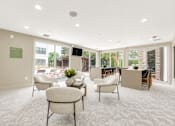 Thumbnail 18 of 53 - Community lounge with floor to ceiling windows at The Barton Apartments, Dallas, TX 75206