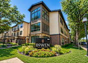 Thumbnail 58 of 69 - A building with a sign that says Bowen in front of it.