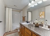 Thumbnail 10 of 32 - Bathroom at Hunters Hill, Dallas, TX