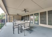 Thumbnail 26 of 57 - sliding glass doors at Indian Creek Apartments, Carrollton, TX