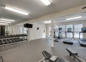 Thumbnail 29 of 57 - Fitness center at Indian Creek Apartments, Texas