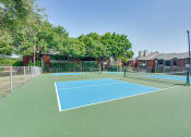 Thumbnail 42 of 57 - Tennis court area at Indian Creek Apartments, Texas