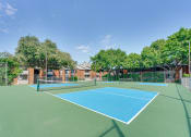 Thumbnail 39 of 57 - Tennis court at Indian Creek Apartments, Carrollton, Texas