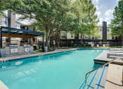 Thumbnail 23 of 42 - Extensive Resort Inspired Pool Deck at Knox Allen Station, Allen, TX