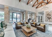Thumbnail 48 of 68 - Living room couch at Limestone Ranch Apartments, Lewisville, TX