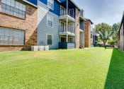 Thumbnail 18 of 32 - commons yard and apartment buildings at The Manhattan Apartments, Dallas