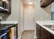 Thumbnail 4 of 32 - Kitchen cabinets at The Manhattan Apartments, Dallas, Texas