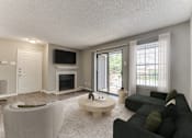 Thumbnail 9 of 51 - Living Area With Fireplace at The Manhattan Apartments, Dallas, TX