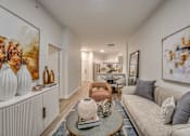 Thumbnail 6 of 52 - Open concept living room with neutral decor at The Montrose Apartments, Texas, 75204