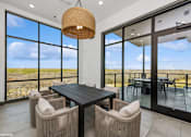 Thumbnail 19 of 29 - A modern dining room with a large table and chairs.