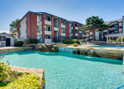 Thumbnail 18 of 41 - our apartments offer a swimming pool in front of our building at Paces Crossing, Denton, Texas