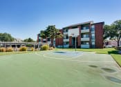 Thumbnail 28 of 41 - a basketball court in front of a building at Paces Crossing, Denton, 76210