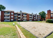 Thumbnail 25 of 41 - an empty yard in front of an apartment building at Paces Crossing, Denton