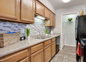 Thumbnail 6 of 32 - Fully Furnished Kitchen at Southern Oaks, Fort Worth, 76132