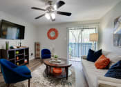 Thumbnail 3 of 32 - Living Room With TV at Southern Oaks, Texas, 76132