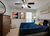 Thumbnail 9 of 32 - Bedroom With Ceiling Fan at Southern Oaks, Fort Worth, TX, 76132