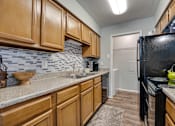 Thumbnail 10 of 72 - Golden color cabinet in kitchen at Southern Oaks, Texas, 76132