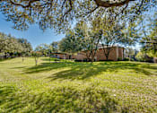 Thumbnail 41 of 72 - house is surrounded by trees at Southern Oaks, Fort Worth Texas