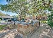Thumbnail 33 of 72 - brick pillar with a planter at Southern Oaks, Texas