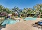 Thumbnail 28 of 72 - pool with stone wall at Southern Oaks, Fort Worth, TX 76132