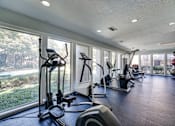 Thumbnail 38 of 72 - gym with treadmills, elliptical machines at Southern Oaks, Texas, 76132