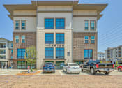 Thumbnail 28 of 29 - The Carter building has a parking lot in front of it.