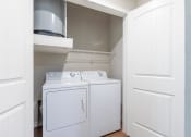 Thumbnail 9 of 22 - Stacked Washer/Dryer at Delray Apartments, Houston, TX, 77077