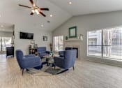 Thumbnail 32 of 39 - Living Area With TV at Wilson Crossing, Texas, 75104