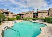 Thumbnail 19 of 29 - Pristine swimming pool at Woodland Hills, Irving, Texas