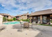 Thumbnail 18 of 29 - Poolside Sundeck at Woodland Hills, Irving, TX
