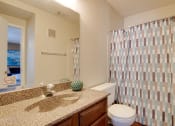 Thumbnail 10 of 29 - Bathroom With Bathtub at Woodland Hills, Texas, 75062