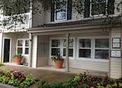 Thumbnail 2 of 13 - A building with a sign that says "No Soliciting Treatment".
