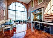 Thumbnail 1 of 41 - resident kitchen and dining table in the Ovaltine Court clubroom