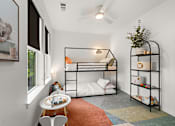 Thumbnail 18 of 46 - A room with a bunk bed and a shelf with toys on it.