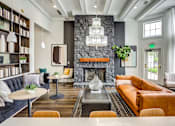 Thumbnail 1 of 47 - a living room with couches and a fireplace