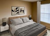 Thumbnail 32 of 41 - Spacious bedroom featuring modern decor and natural lighting