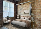Thumbnail 21 of 41 - A bedroom with a brick wall and a bed with a brown headboard.