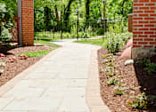 Thumbnail 37 of 41 - walkway outside of Ovaltine Court Apartments in Villa Park, IL