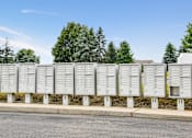 Thumbnail 27 of 37 - a row of white mailboxes on the side of a street