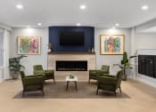 Thumbnail 18 of 43 - the preserve at ballantyne commons community living room with fireplace