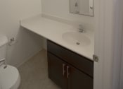 Thumbnail 7 of 15 - this is a photo of the bathroom of a 1 bedroom apartment at deer hill apartments in c
