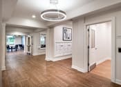 Thumbnail 15 of 54 - a renovated living room and dining room with wood flooring and white walls